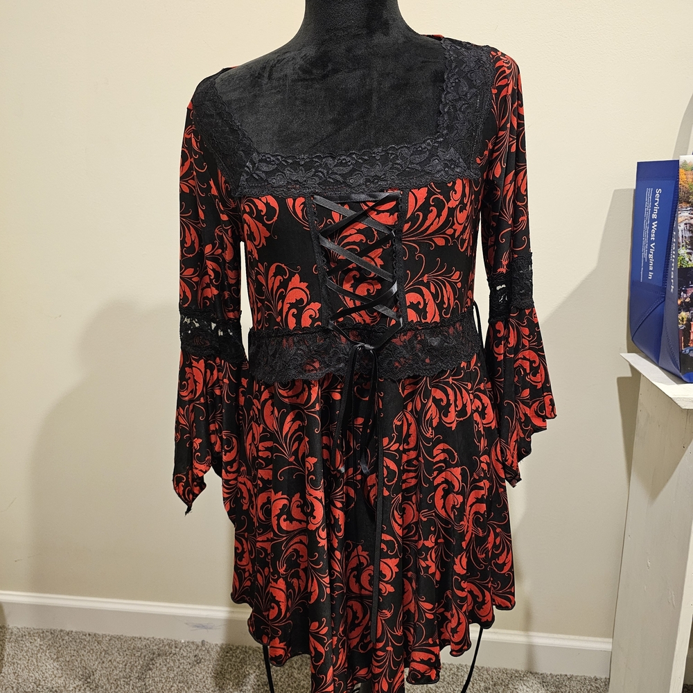 Dare To WearElegant Black and Red Lace-Up Tunic Top